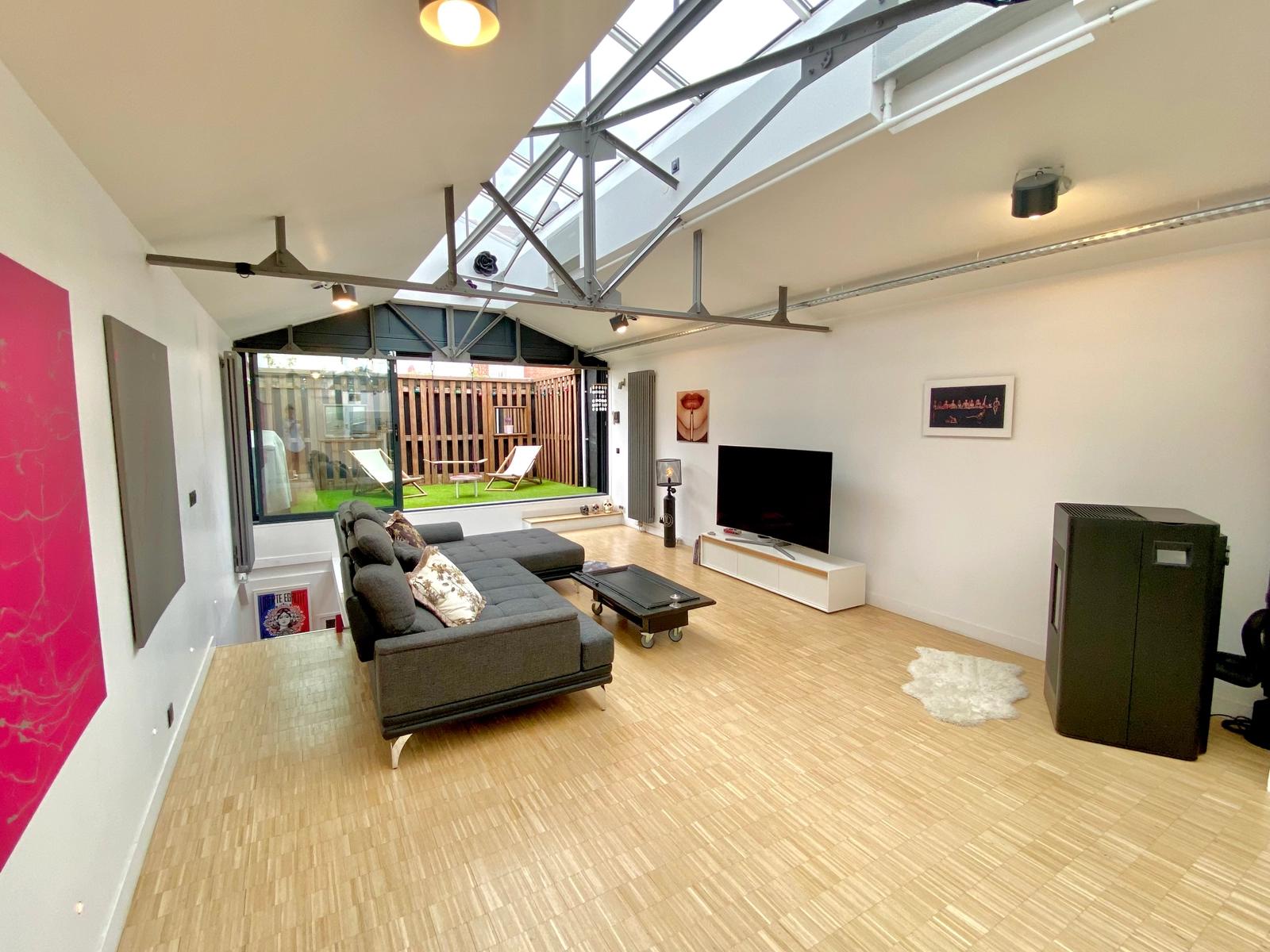 Living room in Loft house with glass roof - 1