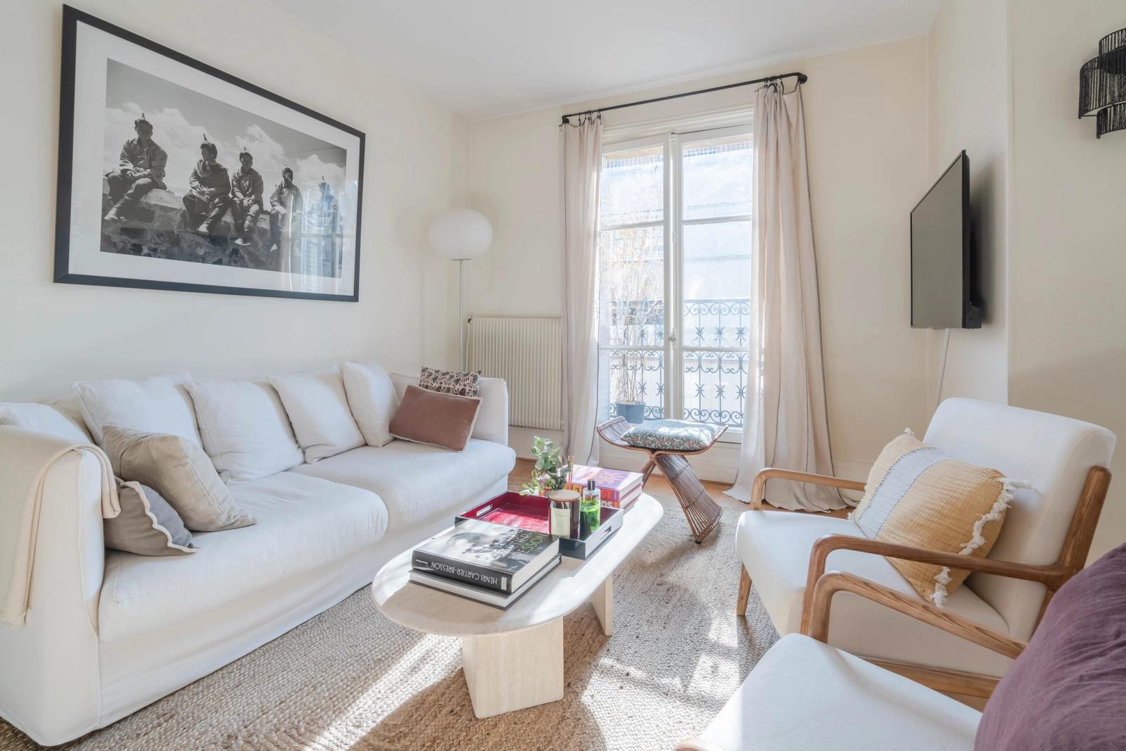 Living room in Light-filled designer apartment in Paris - 5