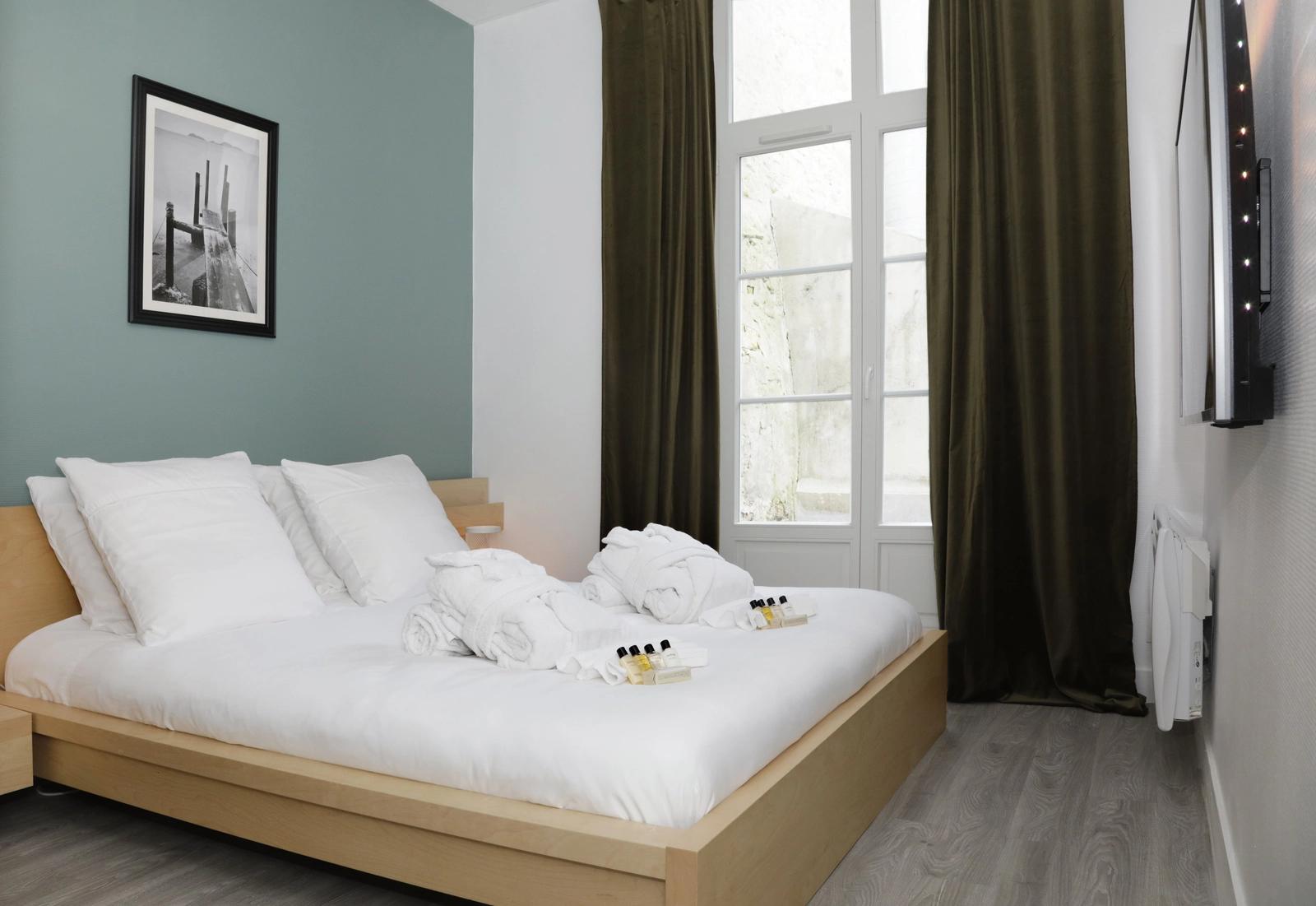 Dormitorio dentro Suite con sauna privada - Cosy Flat Senlis - 4