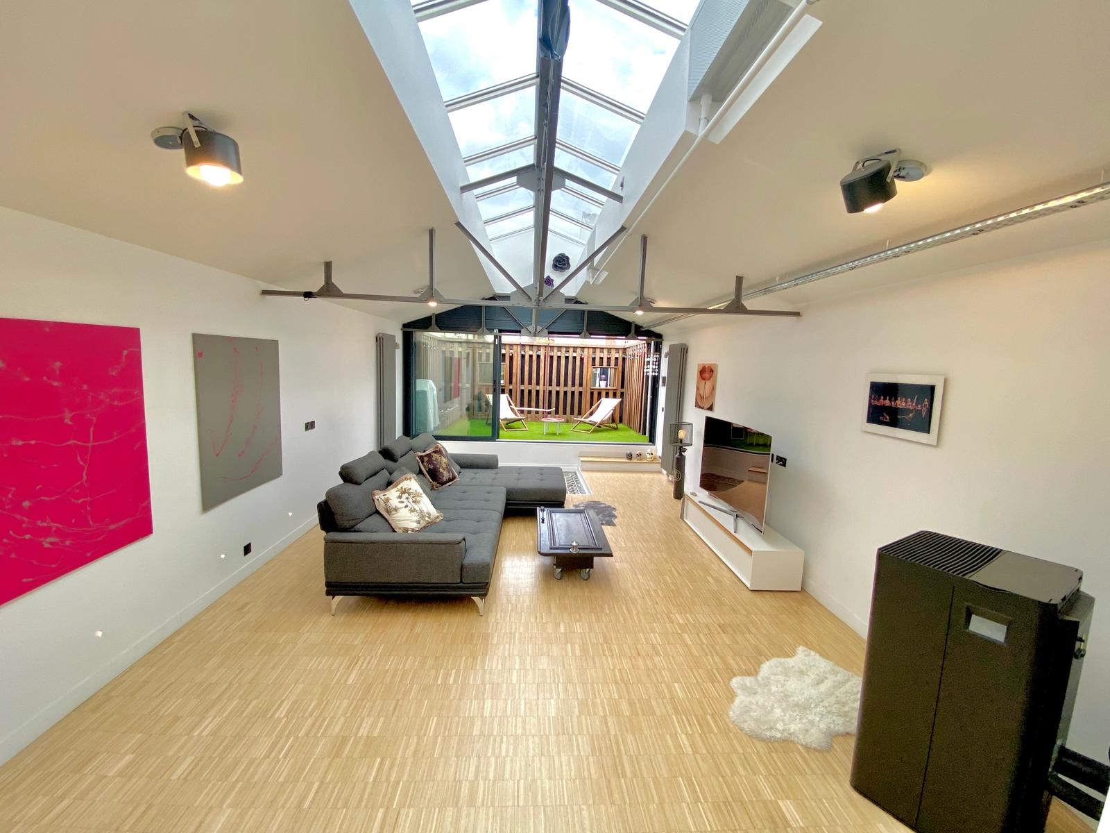 Living room in Loft house with glass roof - 0
