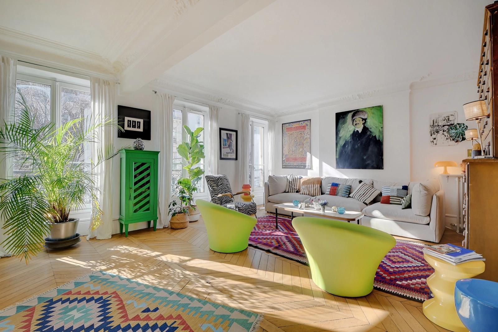 Living room in Typical Parisian apartment with bohemian decor - 0