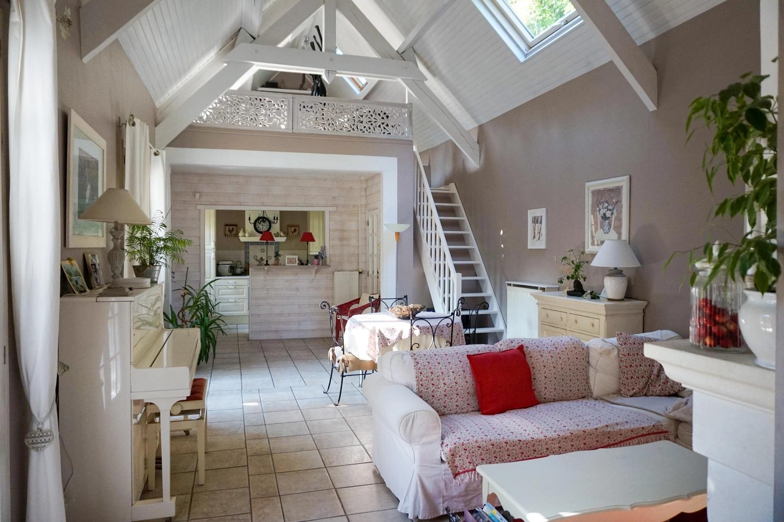 Living room in Provencal-style cathedral ceiling house - 0