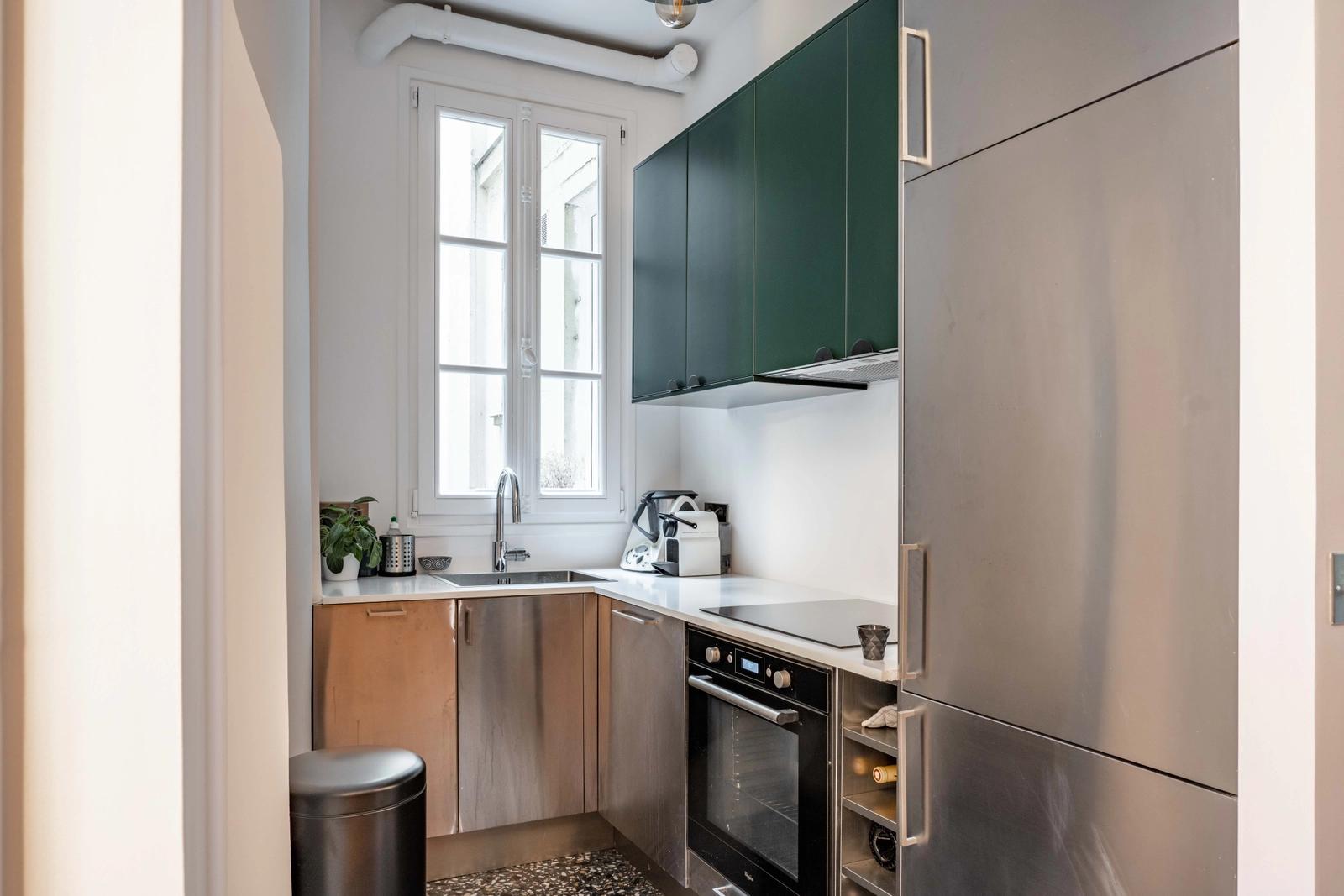 Kitchen in Cosy apartment near the Canal St Martin - 1