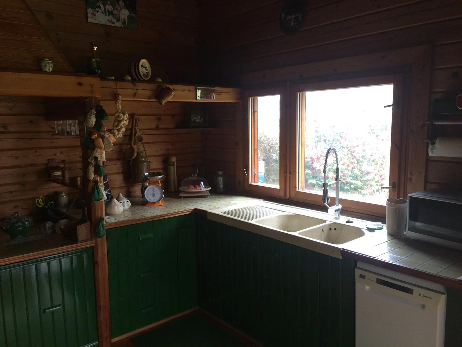 Kitchen dentro Cabaña de madera finlandesa - 5