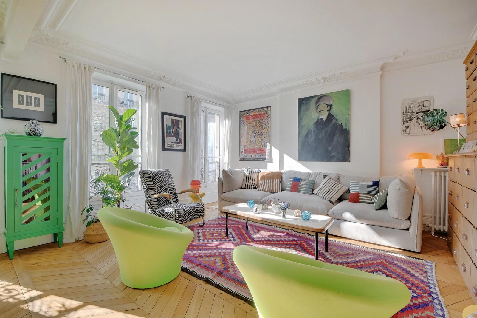 Living room in Typical Parisian apartment with bohemian decor - 5