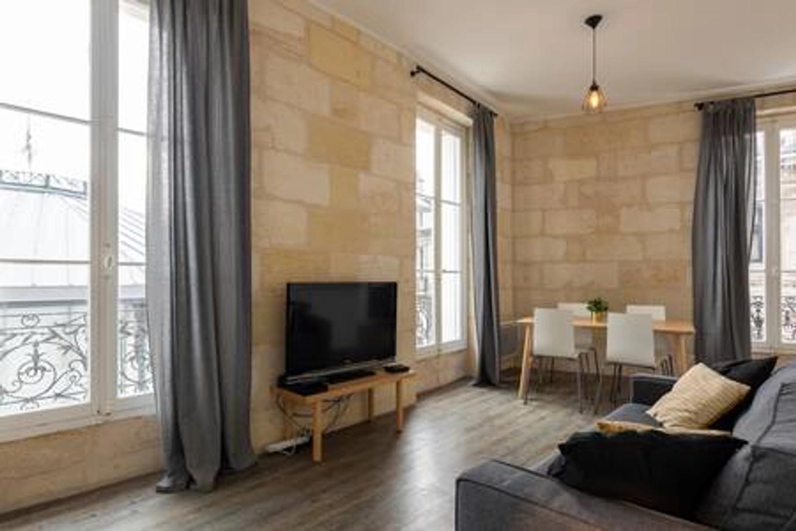 Living room in Renovated T2 in stone building, 45m². - 1