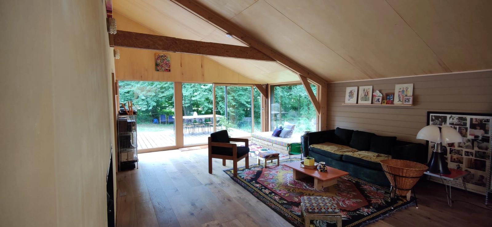 Living room in Modern chalet in the Normandy countryside - 1