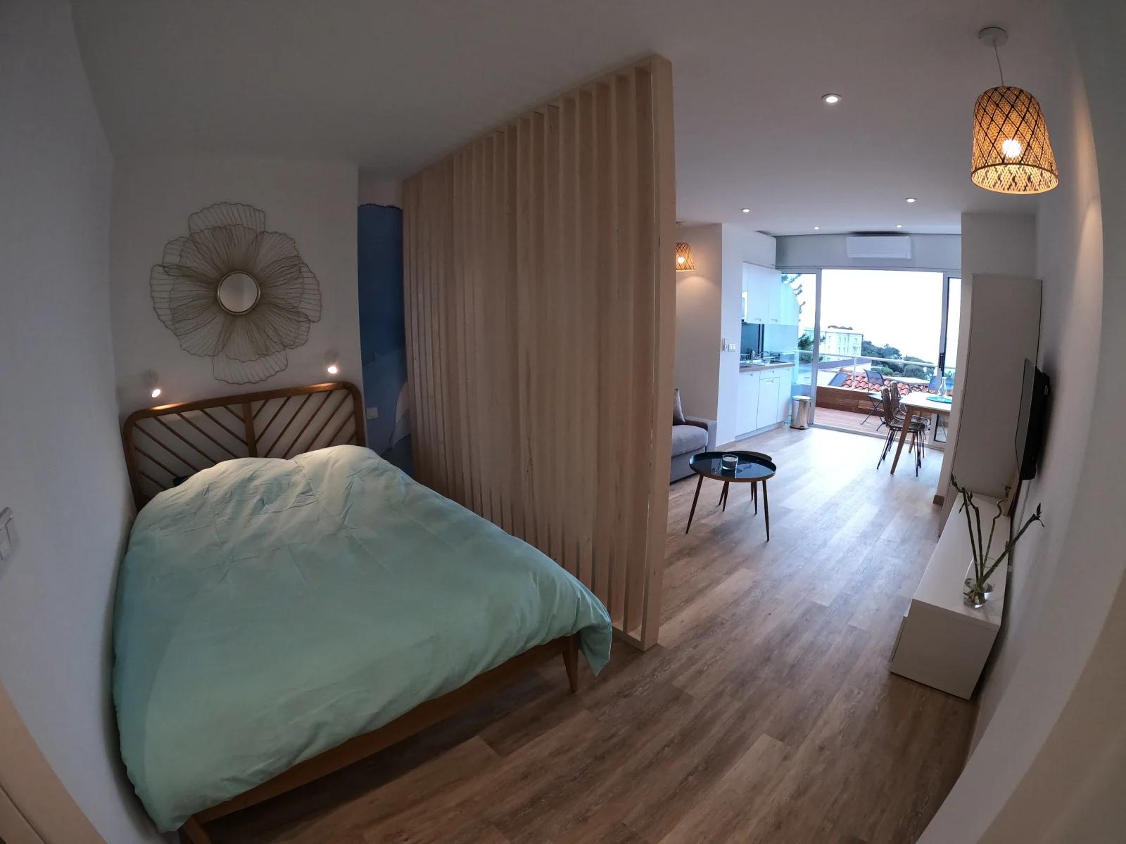 Dormitorio dentro Magnífico estudio con terraza y vistas al mar - 3