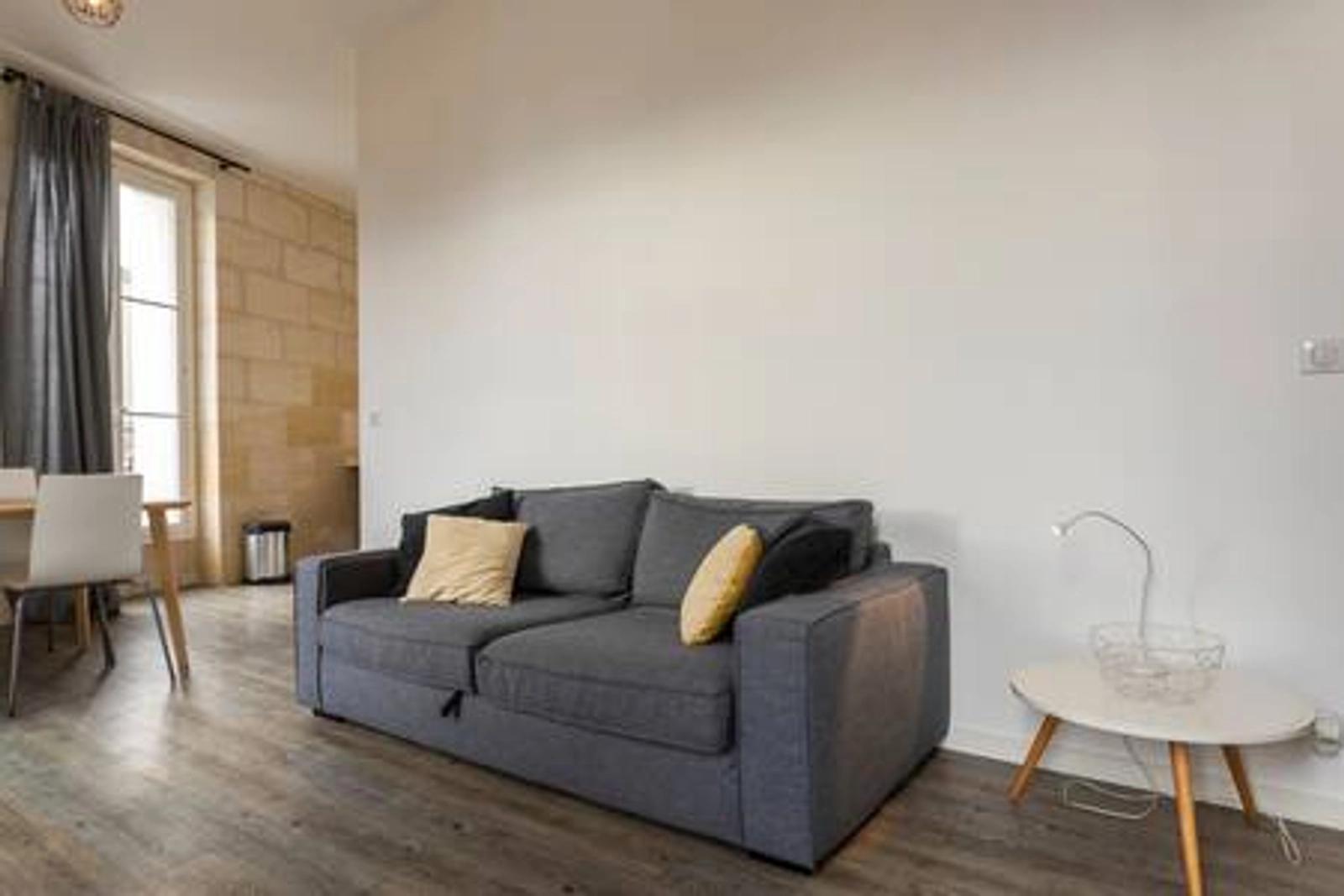 Living room in Renovated T2 in stone building, 45m². - 0