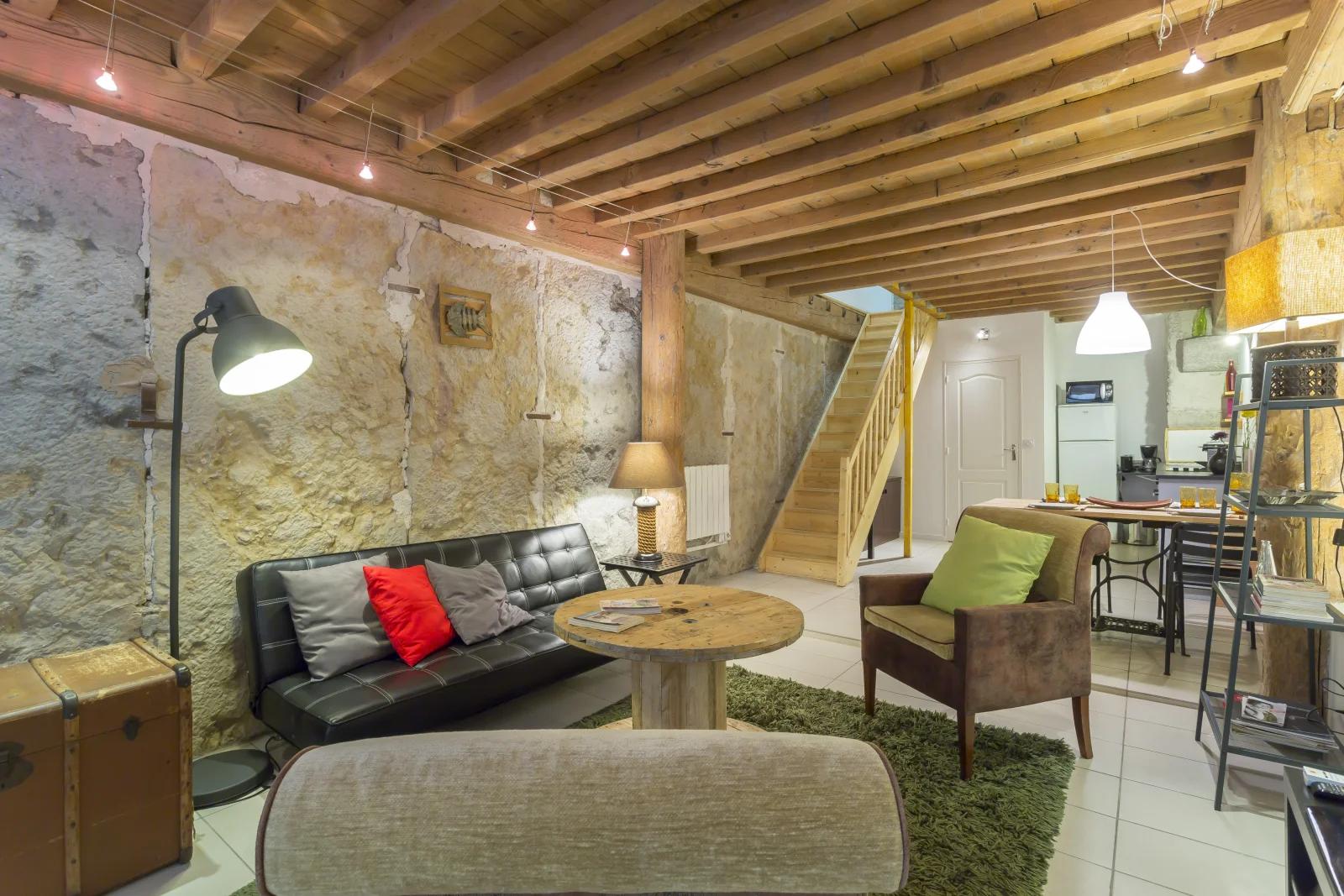 Living room in Loft Design Duplex 73 m² Bellecour Lyon Centre - 4